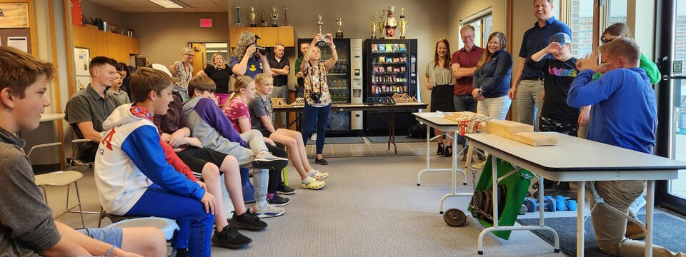 Students Judge Popsicle Stick Bridges Designed by Widseth Employees