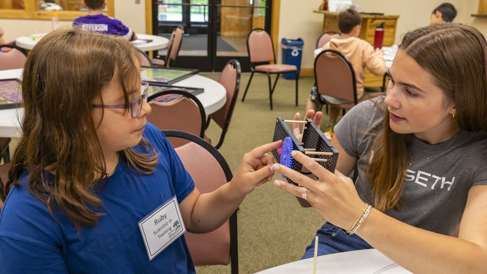 Avery Mulholland Helping at Arboretum STEM Camp 2