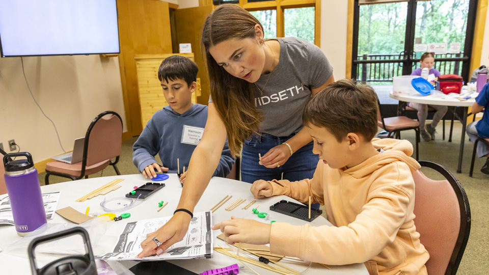 Avery Mulholland Helping at Arboretum STEM Camp 3