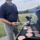 Dana grilling at the Widseth-Pine Island Softball Game-Summer 2026